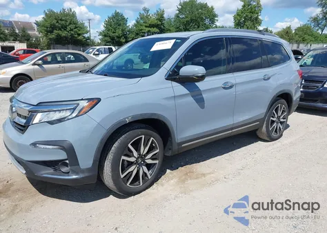 2022 Honda Pilot 2Wd Touring 7 Passenger from USA, damaged, VIN 5FNYF5H6XNB019297